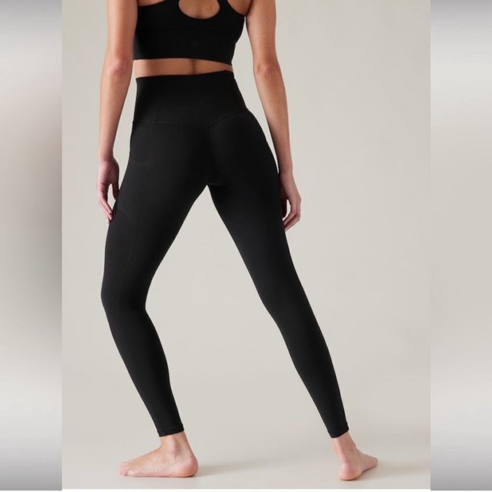 Athleta Salutation Stash Tight.  Size 1X.  Black. Full Length New with out tags